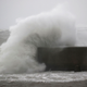 Waves crash off the shore of the city of Miyazaki on Sunday, September 18 as Typhoon Nanmadol approached Japan.